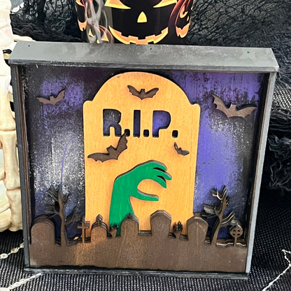 Halloween Mantel Decor Featuring a Graveyard and Tombstone Design