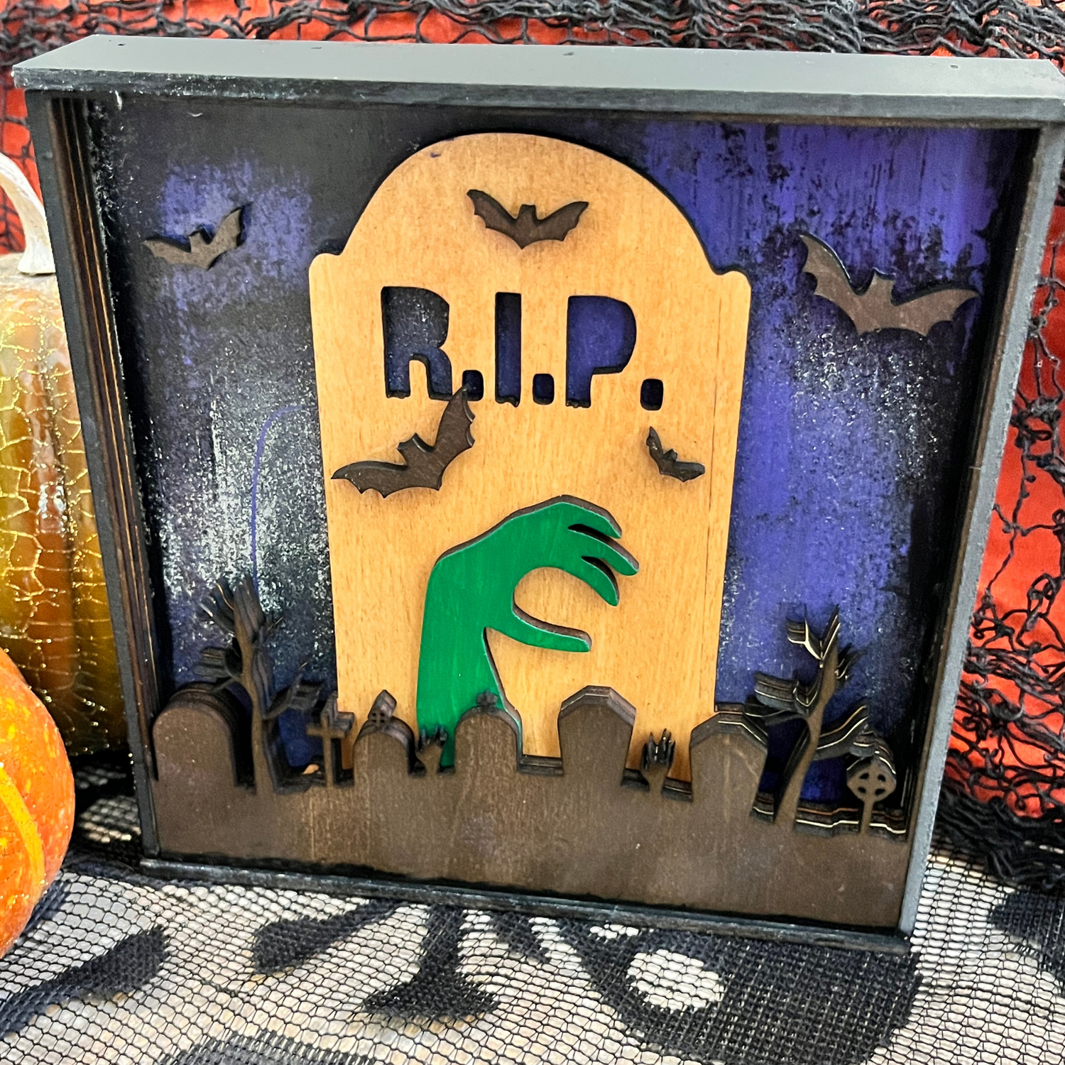 Cute Halloween Mantel Decor Close Up Image of Halloween Graveyard and Tombstone Layered Art.