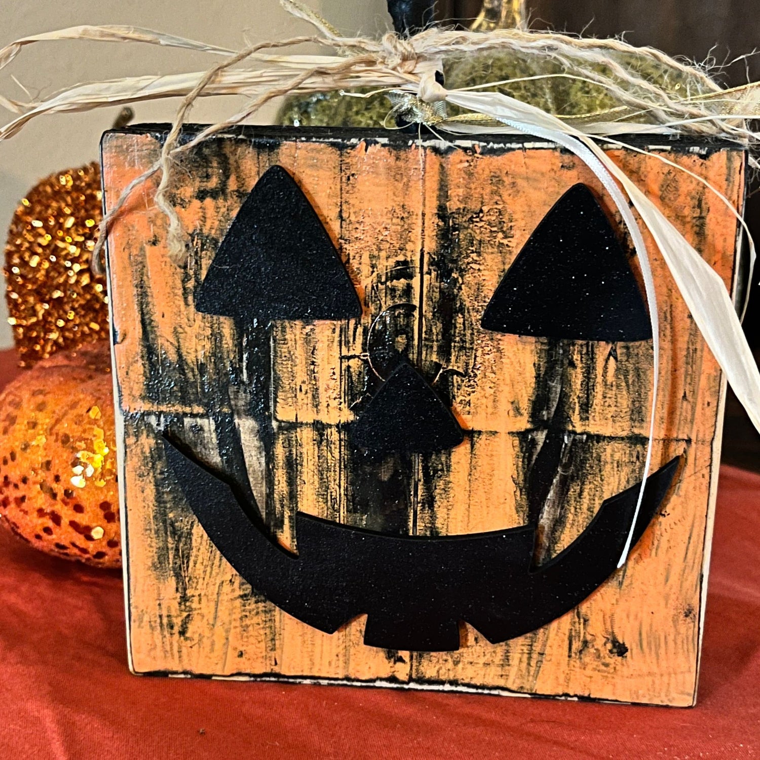 Super cute Pumpkin Decor shelf sitter close up image. Used as a Thanksgiving, Halloween or Fall Mantel Decor.