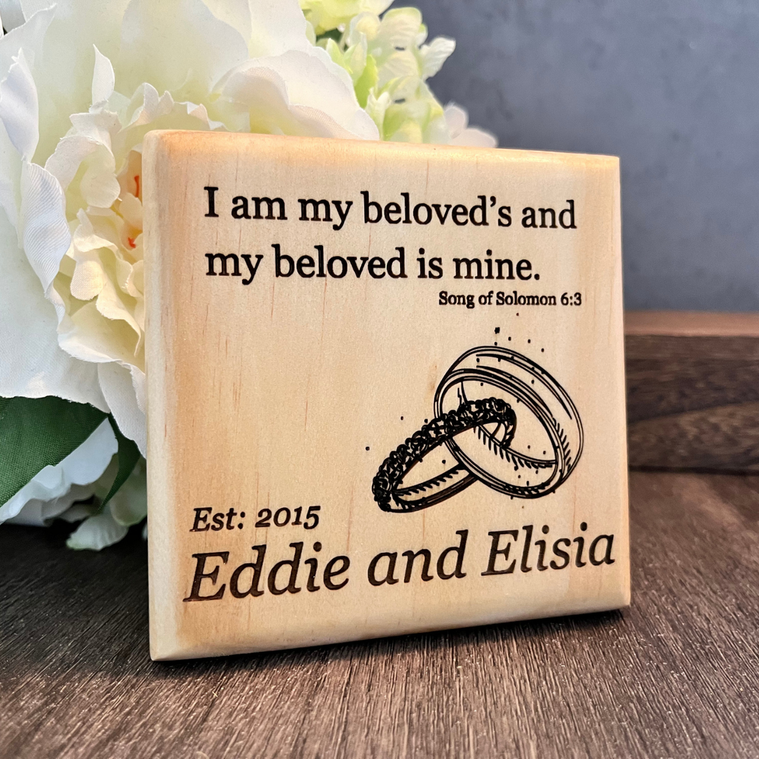 Christian Wood Coaster Laser Engraved product image with Bible Verse Quote Song of Solomon 6:3 including two intertwined rings and personalized engraving.