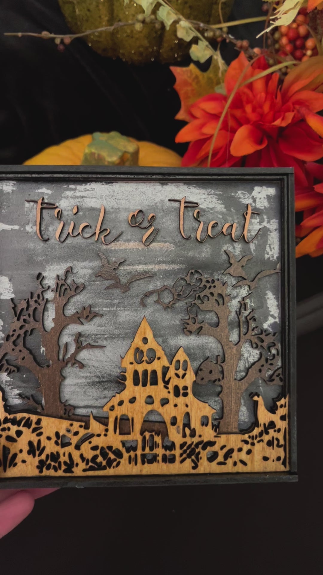 Product video of the Spooky Halloween Decor layered spooky house and bats with Trick or Treat message.